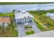 Two-story waterfront home with circular driveway and stunning water views at 16176 La Barge Cir, Port Charlotte, FL 33981