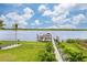 Private dock with boat lift and steps to the water at 16176 La Barge Cir, Port Charlotte, FL 33981