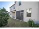 Screened patio and grassy backyard with space for outdoor furniture at 3066 Hover Hall Ln, New Port Richey, FL 34655