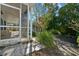 Beautiful tropical backyard with a screened patio, perfect for relaxing at 465 Meadowlark Ln, Palm Harbor, FL 34683