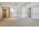 A large bedroom with two closets, a ceiling fan, and multiple light fixtures in the ceiling at 465 Meadowlark Ln, Palm Harbor, FL 34683