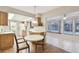 Spacious kitchen with wood cabinets, breakfast nook, and pool view at 465 Meadowlark Ln, Palm Harbor, FL 34683