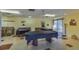 Community room with tables and chairs for gatherings at 4901 Onyx Ln # 202, New Port Richey, FL 34652
