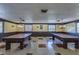 Relax and play in the community game room with two pool tables at 4901 Onyx Ln # 202, New Port Richey, FL 34652