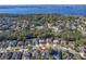 Aerial view of house and surrounding neighborhood at 5211 Karlsburg Pl, Palm Harbor, FL 34685