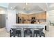 Modern kitchen with stainless steel appliances and breakfast bar at 5211 Karlsburg Pl, Palm Harbor, FL 34685