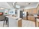 Kitchen with stainless steel appliances and light wood cabinets at 5211 Karlsburg Pl, Palm Harbor, FL 34685