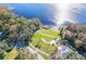 Lakeside community area with walking paths and gazebo at 5211 Karlsburg Pl, Palm Harbor, FL 34685