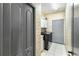 Laundry room with washer, dryer, and extra storage at 5211 Karlsburg Pl, Palm Harbor, FL 34685