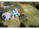 Aerial view of community sports courts and open field at 5211 Karlsburg Pl, Palm Harbor, FL 34685