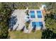 Overhead view of community sports courts, including basketball and pickleball at 5211 Karlsburg Pl, Palm Harbor, FL 34685