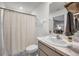 Clean bathroom with shower/tub combo, vanity, and toilet at 5324 Dellbrook Ave, Spring Hill, FL 34608