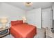 Bright bedroom with a double bed and ample closet space at 5324 Dellbrook Ave, Spring Hill, FL 34608