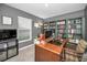 Home office featuring built-in shelving and a large desk at 5324 Dellbrook Ave, Spring Hill, FL 34608
