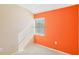Bright bedroom with two-toned walls and a window at 5576 Baywater Dr # 5576, Tampa, FL 33615