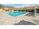 Inviting community swimming pool with plenty of lounge chairs at 5576 Baywater Dr # 5576, Tampa, FL 33615