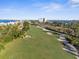 View of the lush green golf course with sand traps visible at 5838 La Puerta Del Sol S Blvd # 162, St Petersburg, FL 33715