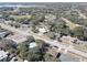 Aerial view of a residential neighborhood showcasing home and street layout at 6470 Treehaven Dr, Spring Hill, FL 34606