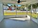 Spacious screened porch overlooking the backyard at 7015 Kingsway Dr, Port Richey, FL 34668