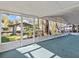 Bright screened porch overlooking a backyard and waterfront at 7195 Bethesda Ct, Weeki Wachee, FL 34607