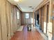 Kitchen under renovation with tiled floors and exposed framing at 8030 Gulf Way, Hudson, FL 34667