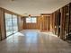 Open living area with tiled floors and walls under construction at 8030 Gulf Way, Hudson, FL 34667