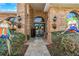 Home entrance with double doors and brick columns at 8700 Cessna Dr, New Port Richey, FL 34654