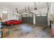 Three-car garage with high ceilings and extra storage at 8700 Cessna Dr, New Port Richey, FL 34654