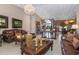 Bright and airy living room with high ceilings and elegant furnishings at 8700 Cessna Dr, New Port Richey, FL 34654