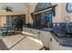 Outdoor kitchen with granite countertops, sink, and grill at 8700 Cessna Dr, New Port Richey, FL 34654