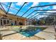 Spa and pool with a screened enclosure at 8700 Cessna Dr, New Port Richey, FL 34654