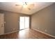 Bedroom with sliding door to balcony at 8718 Mallard Reserve Dr # 202, Tampa, FL 33614
