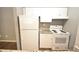White appliances and granite countertops in this kitchen at 8718 Mallard Reserve Dr # 202, Tampa, FL 33614