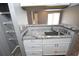 Kitchen features granite countertops and a stainless steel sink at 8718 Mallard Reserve Dr # 202, Tampa, FL 33614