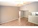 Living room with laminate wood flooring and ceiling fan at 8718 Mallard Reserve Dr # 202, Tampa, FL 33614
