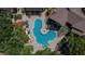 Aerial view of community pool with hot tub at 8718 Mallard Reserve Dr # 202, Tampa, FL 33614