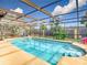 Inviting screened pool area, perfect for relaxation at 12136 Shadow Ridge Blvd, Hudson, FL 34669