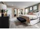 Spacious bedroom with king-size bed and neutral decor at 12458 Amber Creek Cir, Lakewood Ranch, FL 34211
