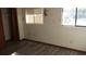 Bedroom with wood-look floors and a unicorn wall decal at 12719 Lockey Ln, Tampa, FL 33612