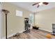 Bedroom with cat tree, window, and closet at 14004 Lugano Ct, Hudson, FL 34669