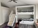 Bedroom with built-in bunk beds and ample floor space at 1922 Oswego Dr, Holiday, FL 34691