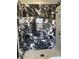 Black and white marble shower with a unique pattern at 1922 Oswego Dr, Holiday, FL 34691