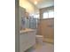 Updated bathroom with walk-in shower and modern vanity at 2360 World Parkway Blvd # 4, Clearwater, FL 33763