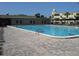 Large community pool with ample deck space at 2360 World Parkway Blvd # 4, Clearwater, FL 33763