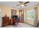 Home office with a desk, chair, and antique wooden cabinet at 247 Oriana Dr, Spring Hill, FL 34609