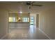 Bright living room with tile floors and a view of the patio at 2765 Countryside Blvd # 105, Clearwater, FL 33761