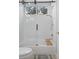 Clean bathroom featuring a shower/tub combo and updated tile at 3042 Wentworth Way, Tarpon Springs, FL 34688