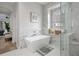 Relaxing bathroom with soaking tub and marble accents at 3042 Wentworth Way, Tarpon Springs, FL 34688