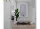 Bright entryway with decorative stone niche and bench at 3042 Wentworth Way, Tarpon Springs, FL 34688
