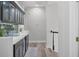 Wet bar with dark cabinetry, glass-front doors, and a wine cooler at 3042 Wentworth Way, Tarpon Springs, FL 34688